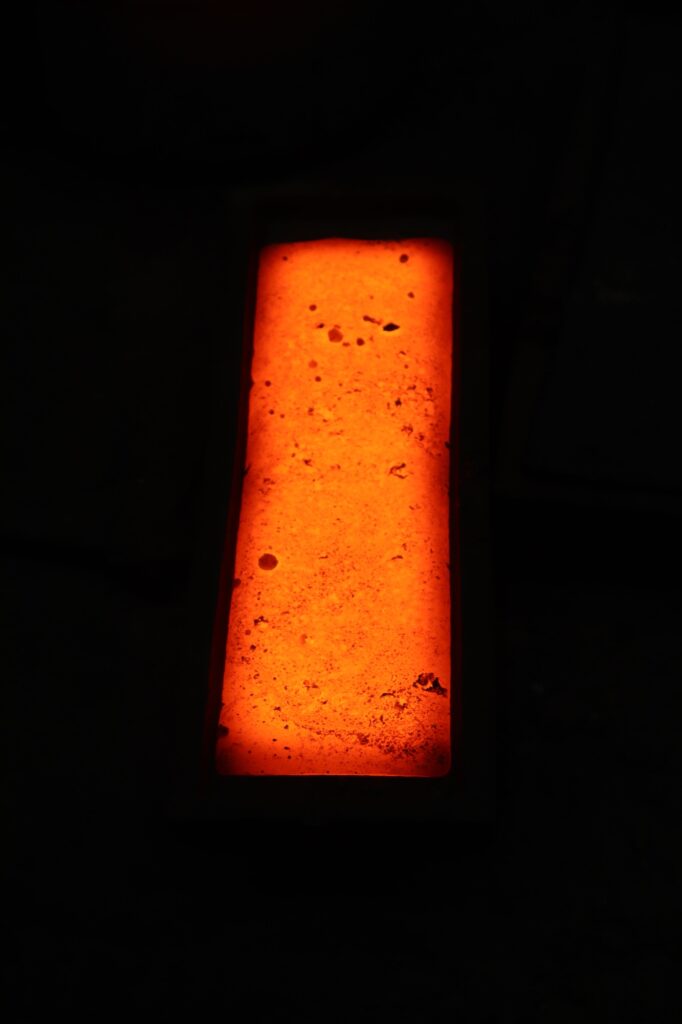 pouring molten metal - metal industry work